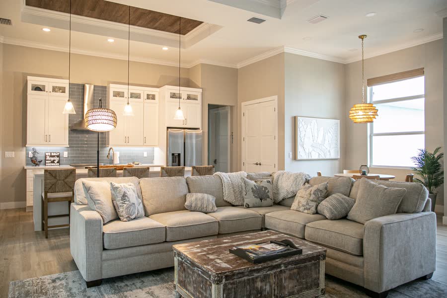 Great room with sectional seating open to the kitchen