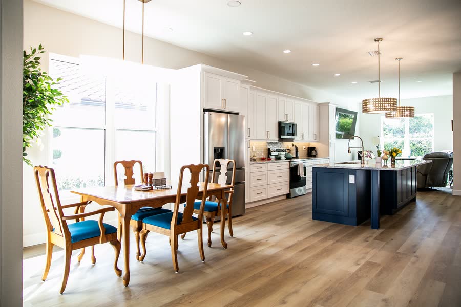 Open plan kitchen and dining area photographed for a Sarasota listing